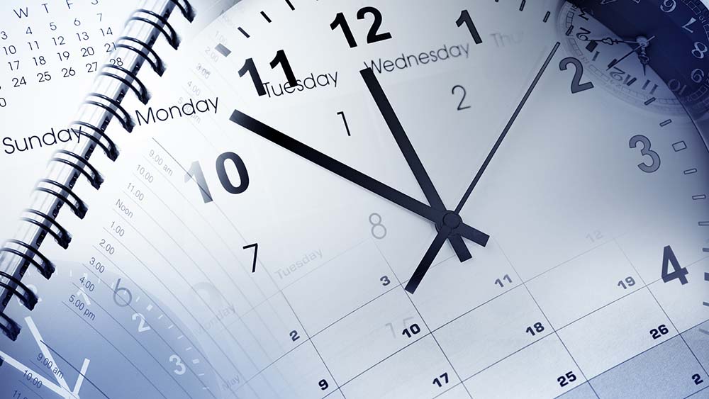 Calendar and clocks showing the passing of time since home inspection services were scheduled